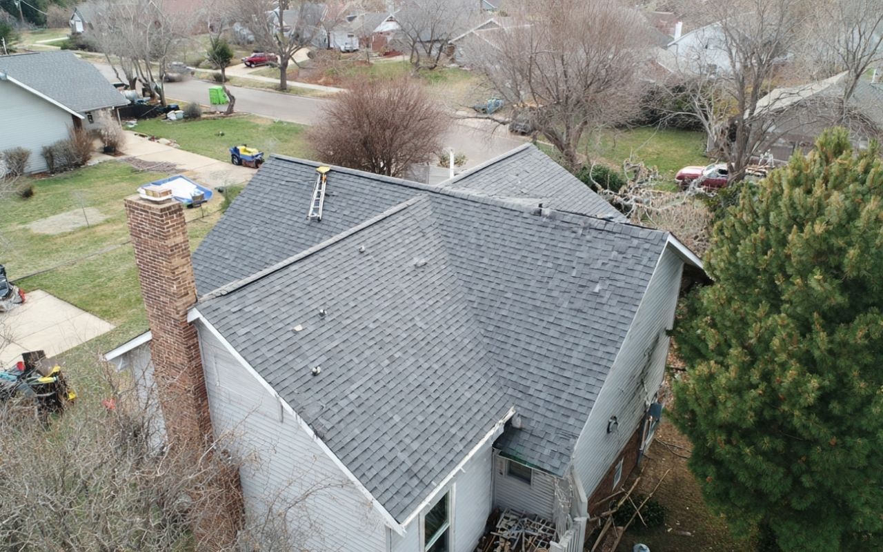Lee's Summit safe trimming near roofs & gutters along the roofline
